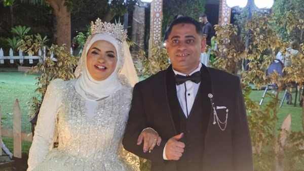 الكاتب الصحفي محمد مصلوح وزوجته