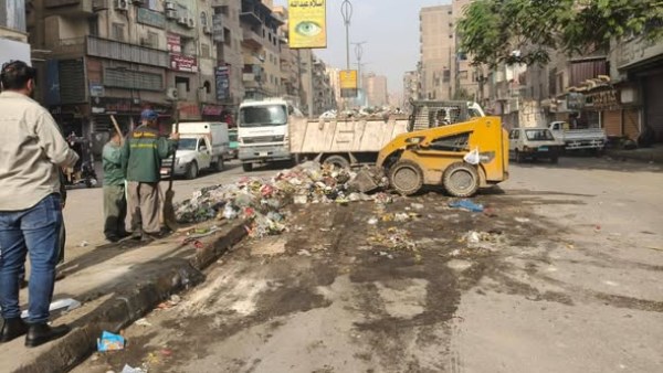 حملة نظافة مكبرة بشارع عثمان محرم في الطالبية والعمرانية