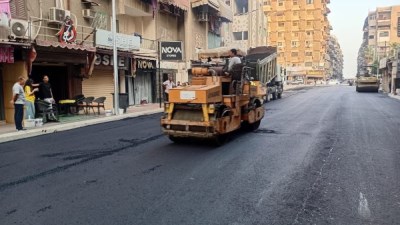  وضع الطبقة الإسفلتية بشارع المعتصم بالله