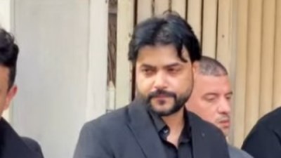 والد المؤلف محمود حمدان