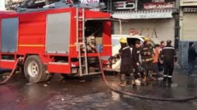 إصابة عدد من طلاب مدرسة الجيزة الإعدادية بحالات اختناق إثر حريق داخل محل ملابس الزعبلاوي بميدان الجيزة 