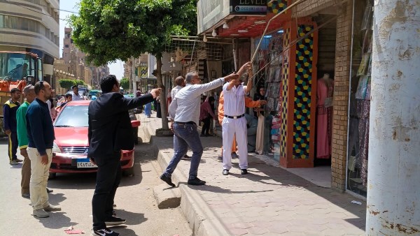 أثناء جولة لرفع إشغالات شارع حتحوت
