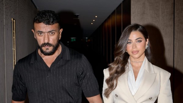 أحمد العوضى ويارا السكرى 